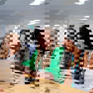 Combined Authority Colleagues Working At Laptop Together