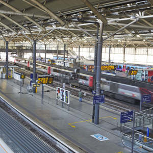 Wide view of platforms and trains at Leeds train station