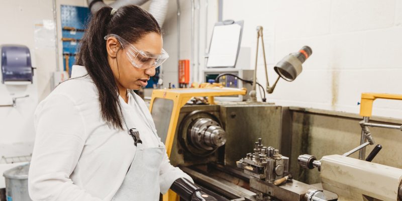 Woman Operating Machinery