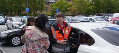 Car seat check talking to family