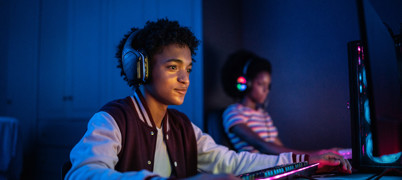 Two young people on computers