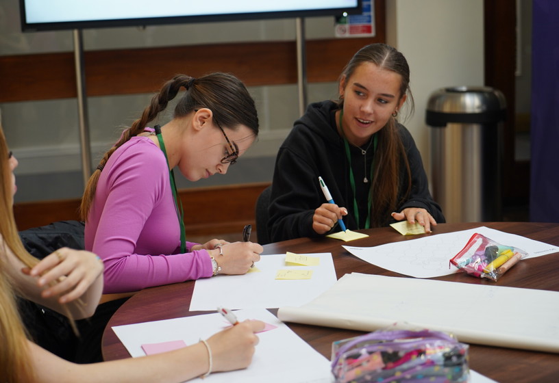 Children working at school, making posters 