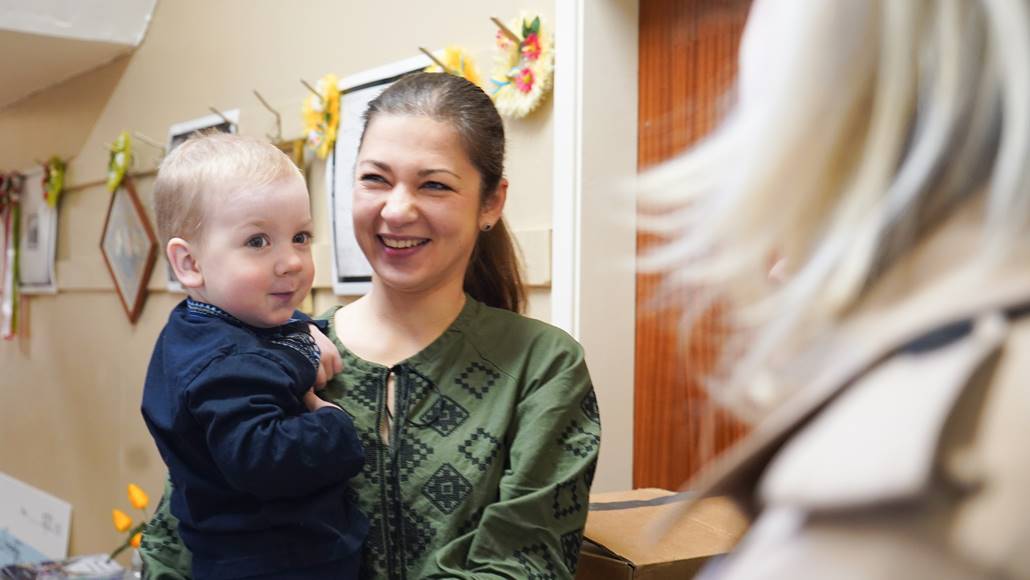 Mayor with woman and baby Leeds Ukrainian centre