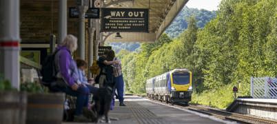 People waiting at platform at Hebden Bridge station