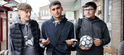 Three young men in casual clothing, for the Just Don't campaign