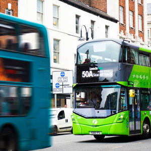 A green coloured bus in Leeds