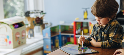 Child playing on iPad 