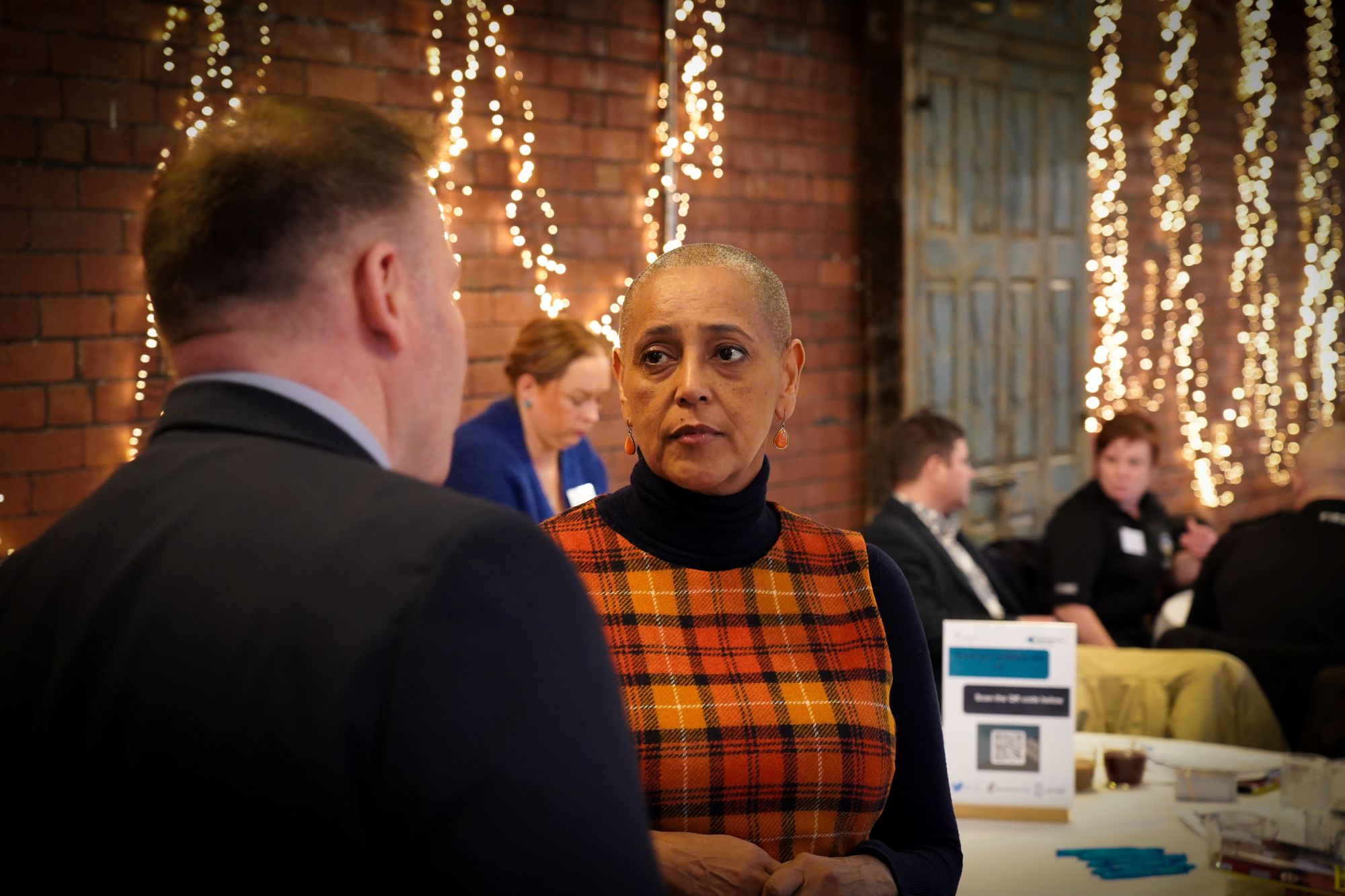 Alison Lowe speaking with someone at a VRP event