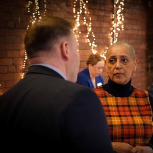 Alison Lowe speaking with someone at a VRP event