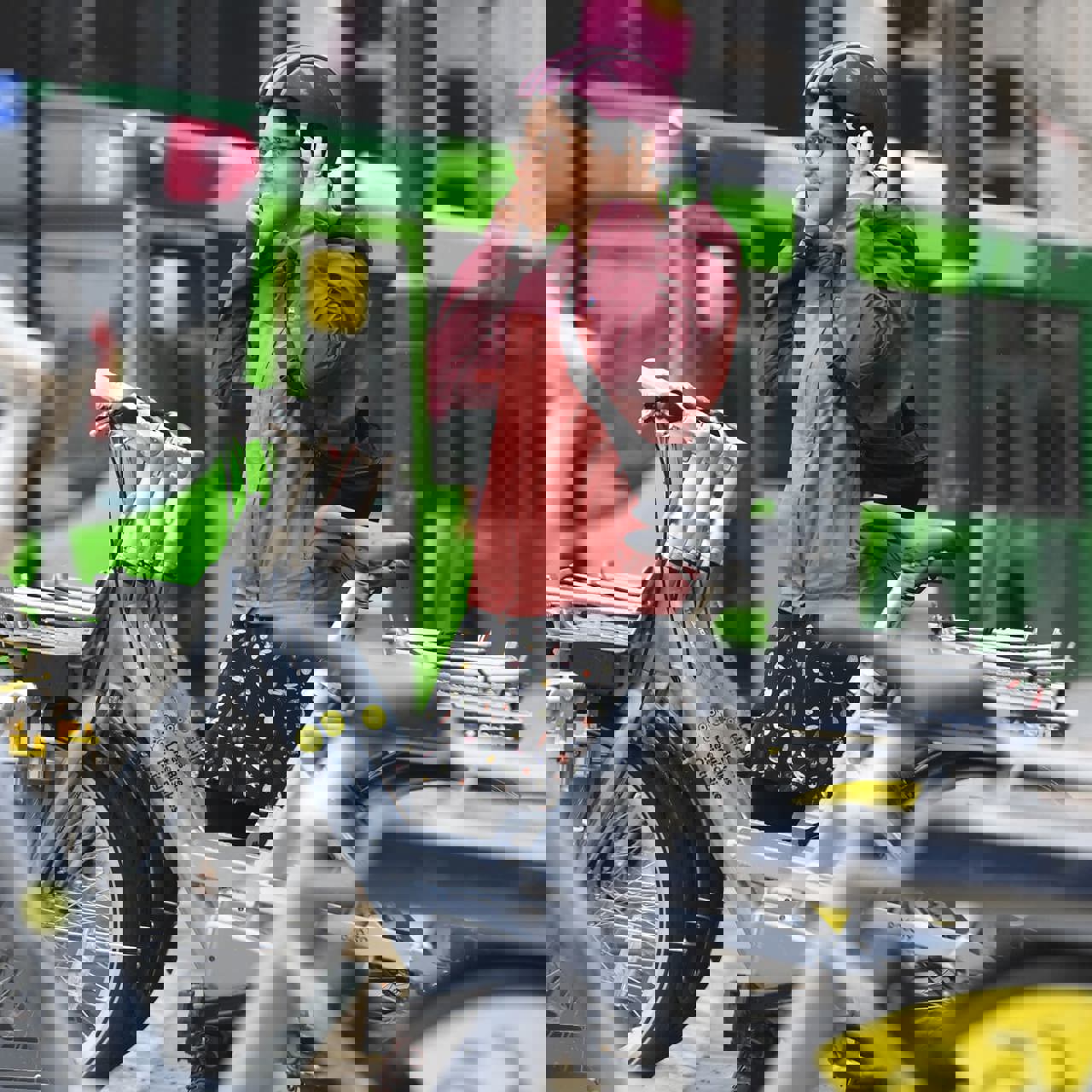 Woman next to Leeds City bikes stand