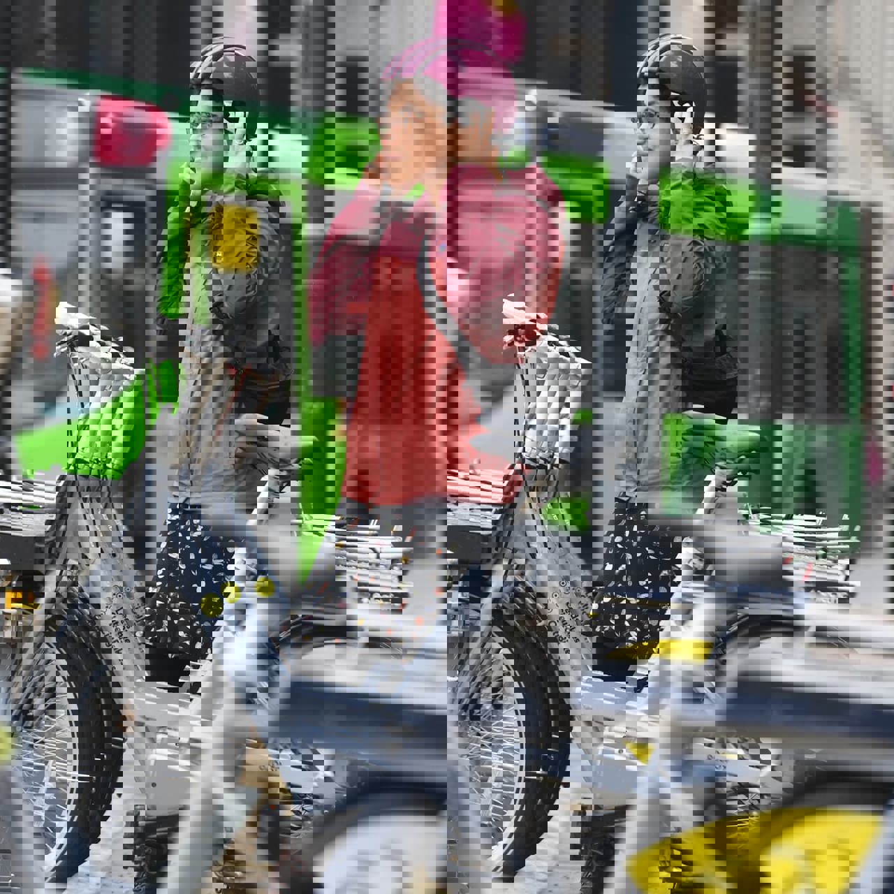 Woman next to Leeds City bikes stand