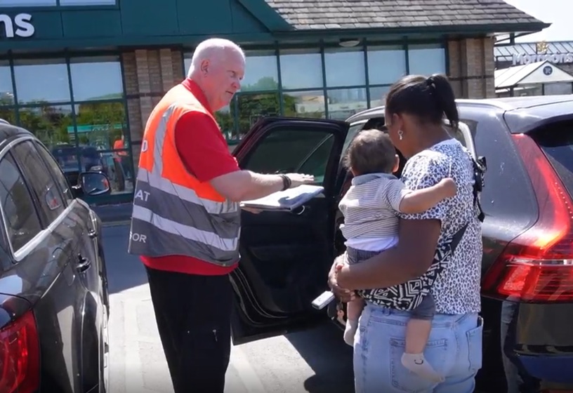 Child car seat check with family