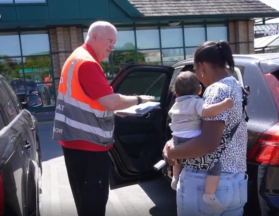 Child car seat check with family