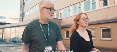 Eloise walking and talking with her Employment West Yorkshire adviser