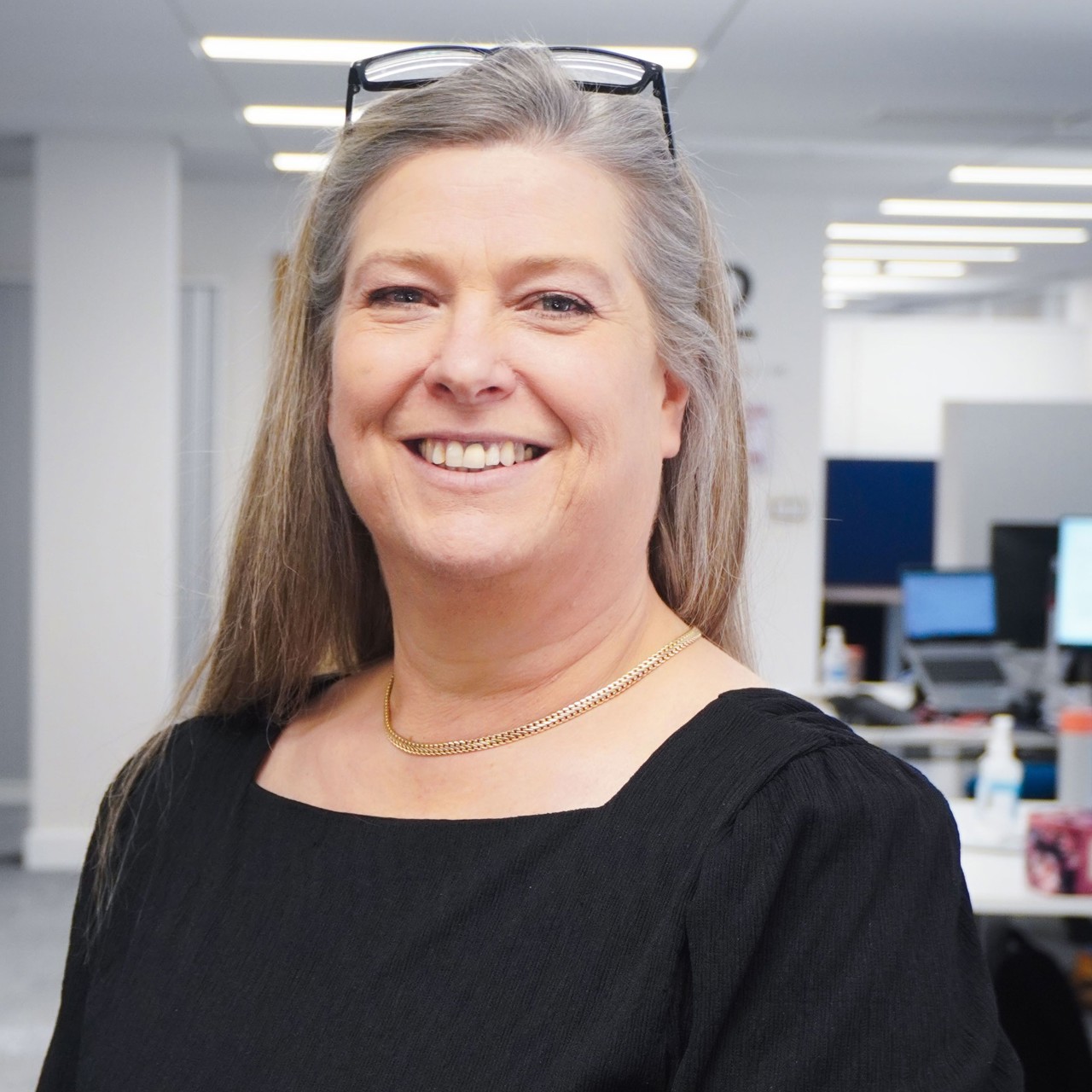 Headshot of Bron Baker, Head of Internal Audit