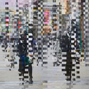 Women walking down the street together in Leeds