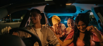 Young people driving in a car