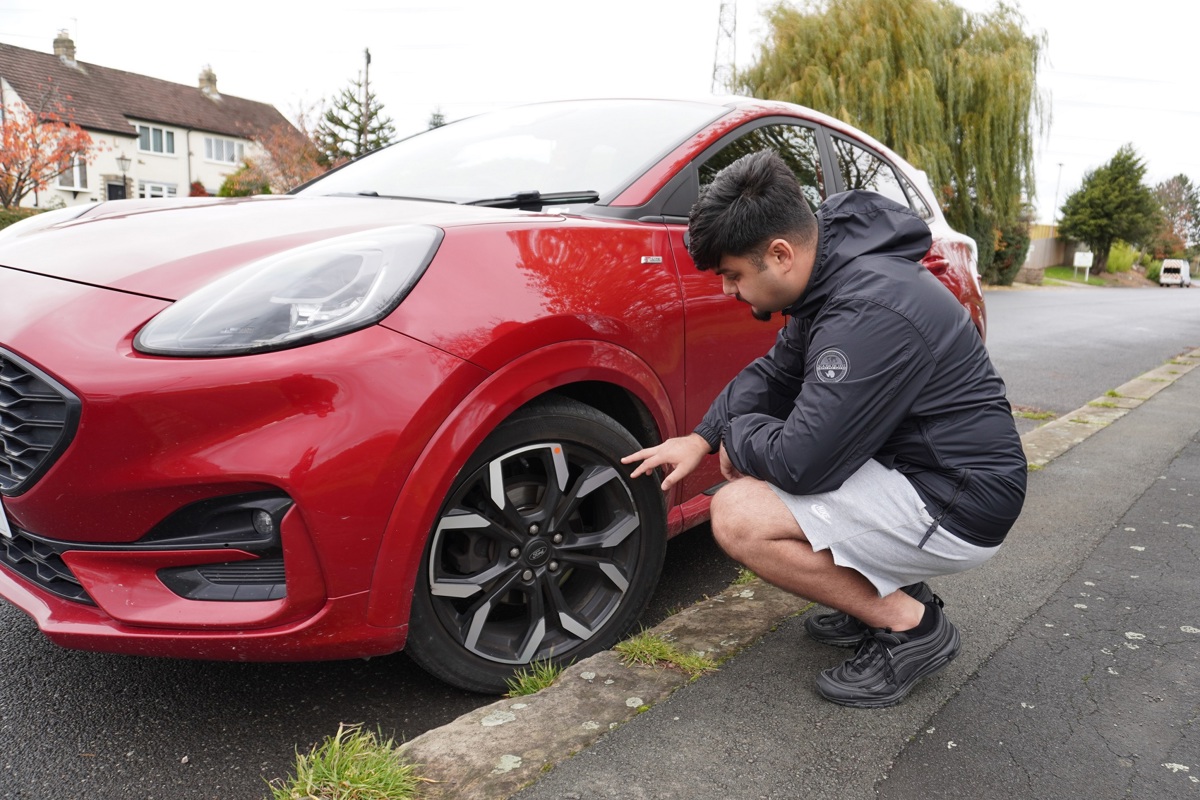 Tyre check red car