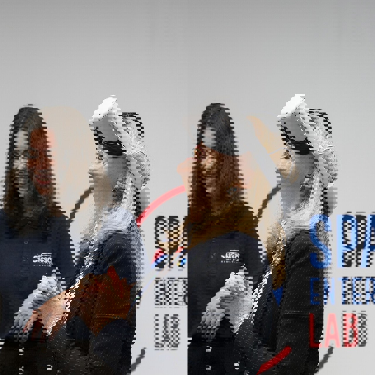 Women wearing VR goggles