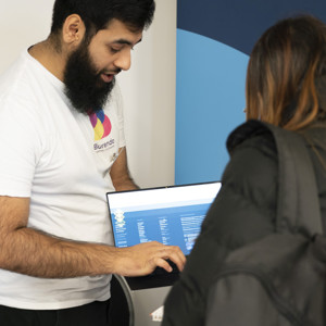 Attendee at Skills for Growth event looks at a display