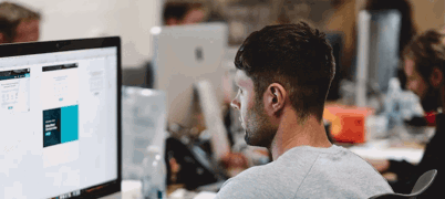 apprentice working at computer