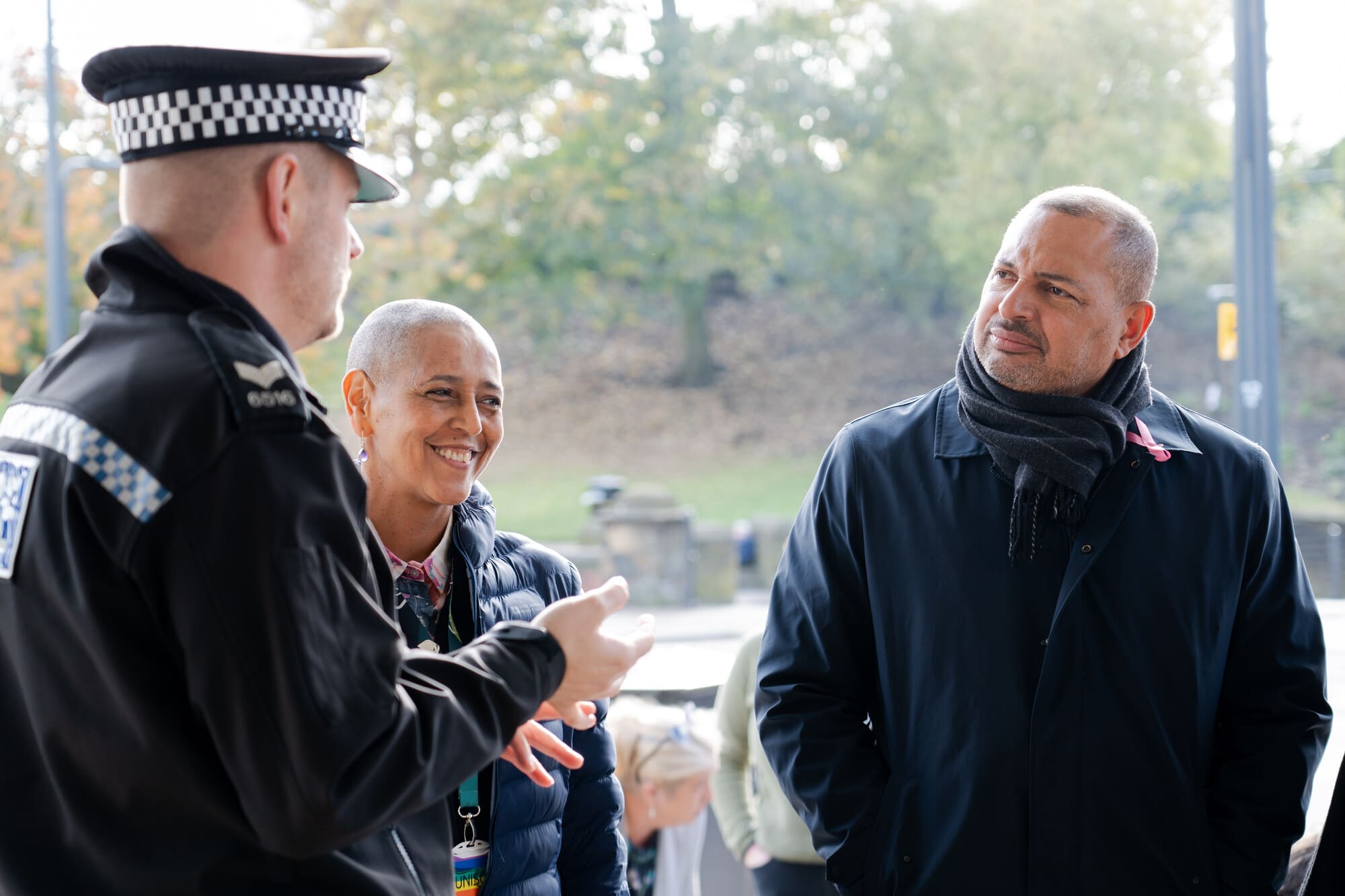 Police officer and Alison Lowe, West Yorkshire Deputy Mayor for Policing and Crime, speaking to people