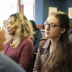 Delegates listening to talk at graduate event