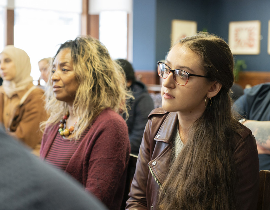 Delegates listening to talk at graduate event