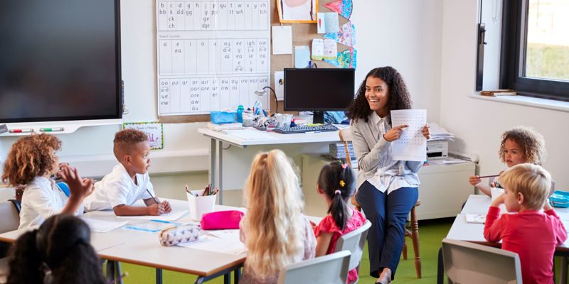 Female Primary School Teacher In A Classroom