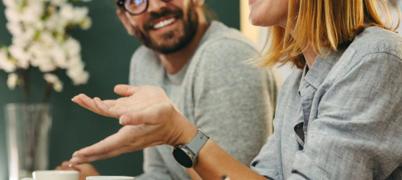 People chatting in a meeting