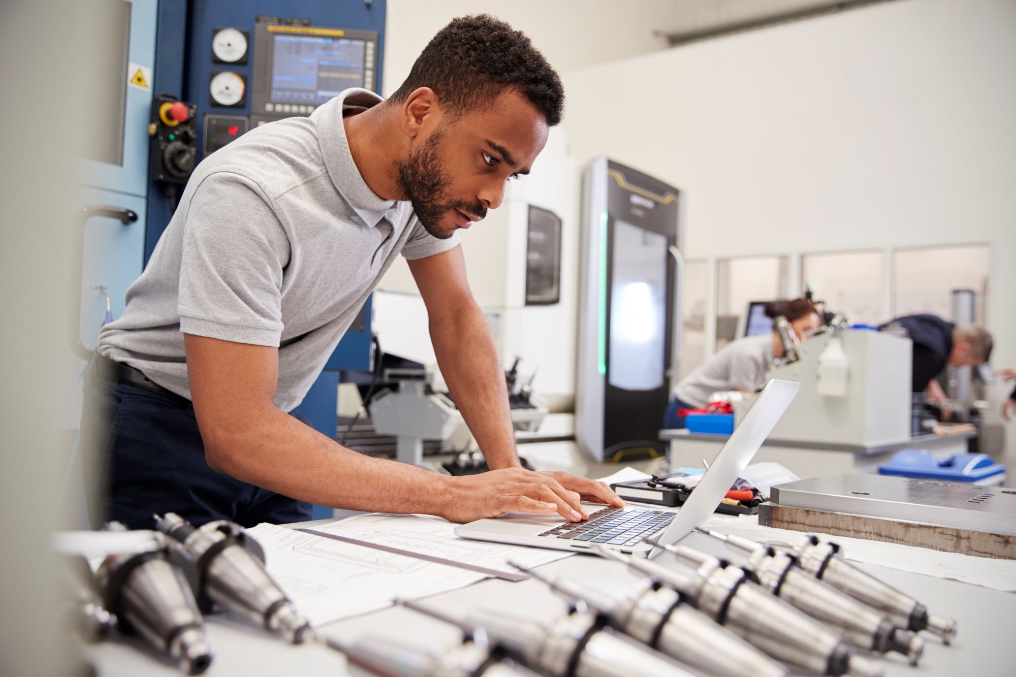 Man working on a laptop in a lab