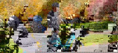 Woman With Bike In Park 2025