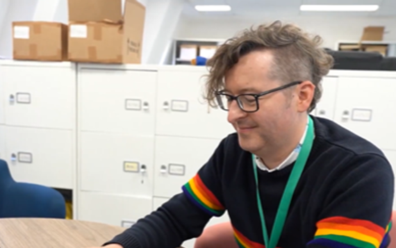 Jonathan, Enterprise Coordinator at the Combined Authority, working at laptop 