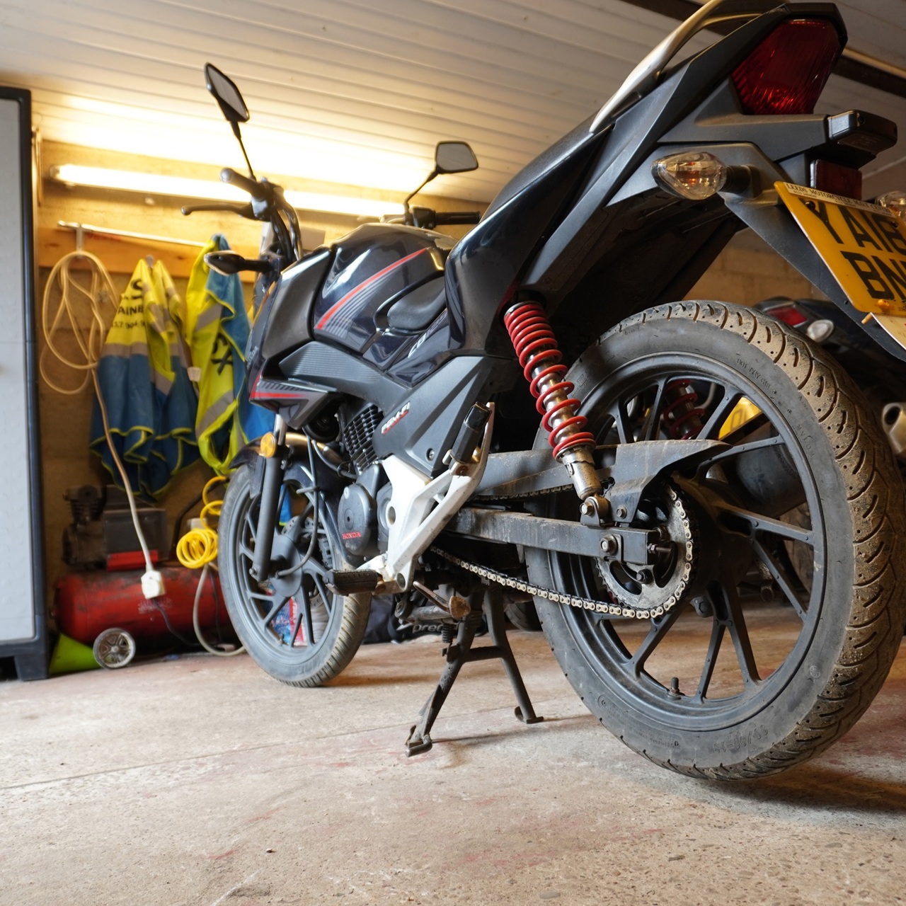 A motorbike parked in a garage