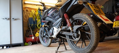 A motorbike parked in a garage