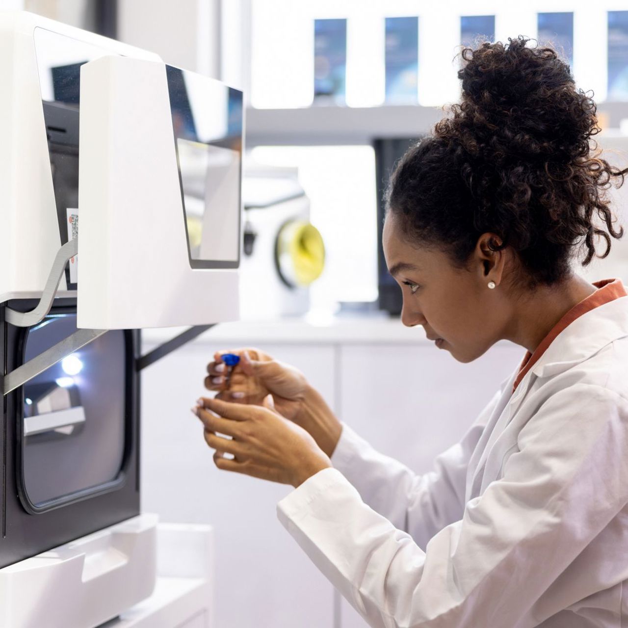 Scientist looks into equipment